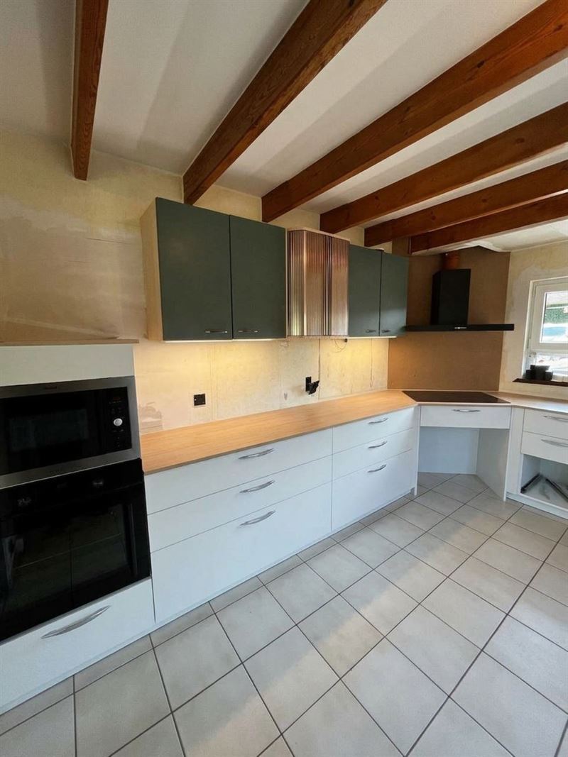 Cuisine ouverte de style moderne blanc à Biesme Mettet | Raison Home - 1