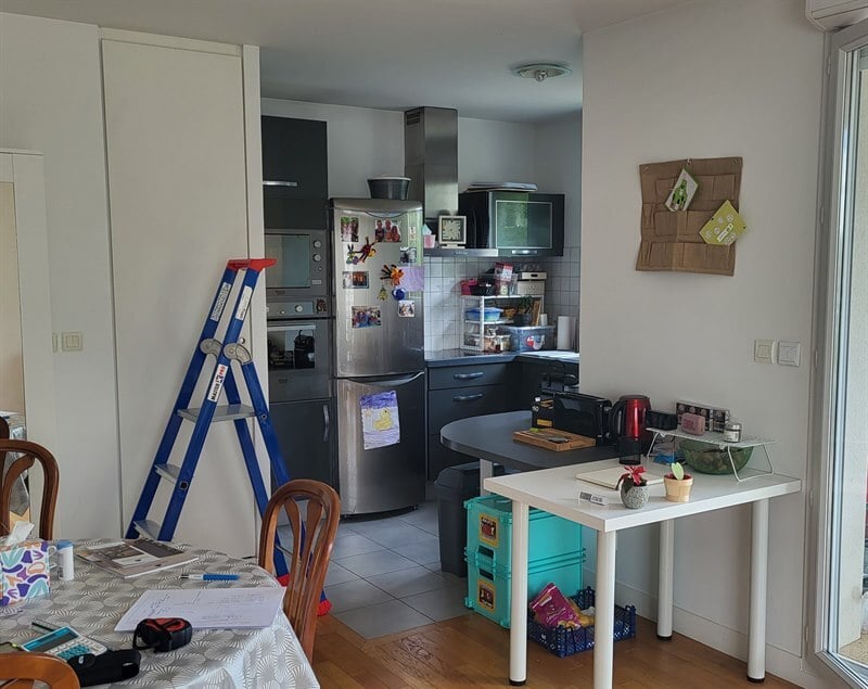 Cuisine ouverte bois et beige à Basse Goulaine | Raison Home - 7