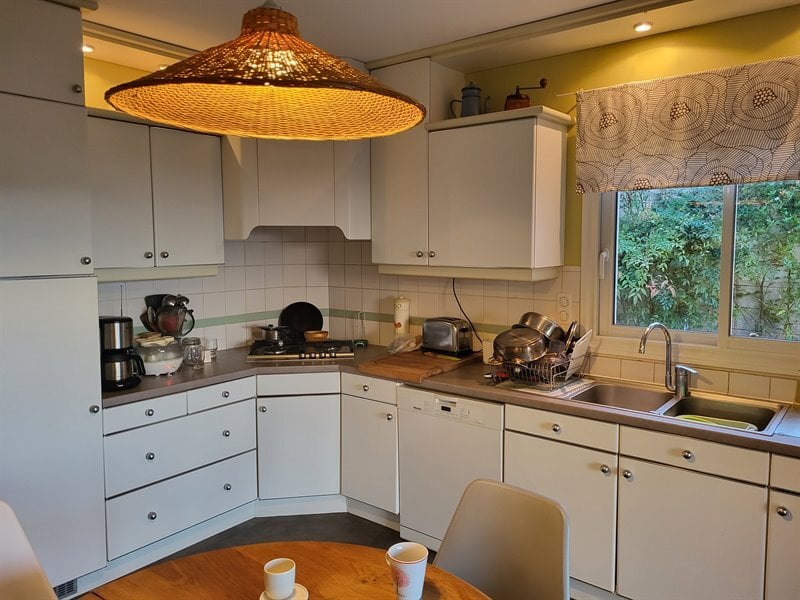 Cuisine en L bois et orange à La Haie Fouassiere | Raison Home - 9